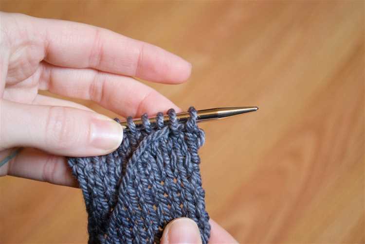 Pass the first stitch over the second stitch
