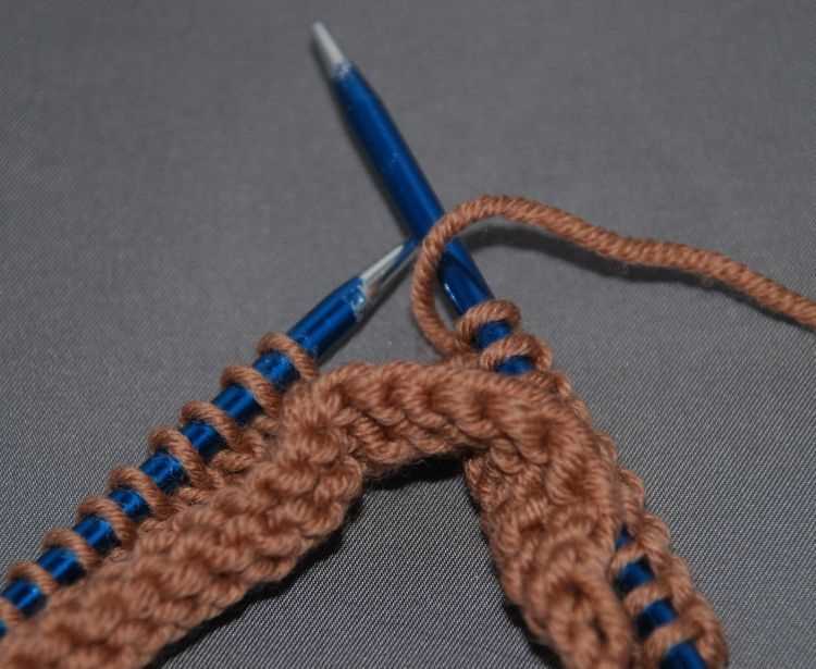 Learn how to knit a yarn over step by step