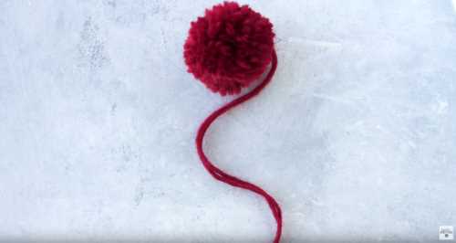 Learn how to make a knit pom pom
